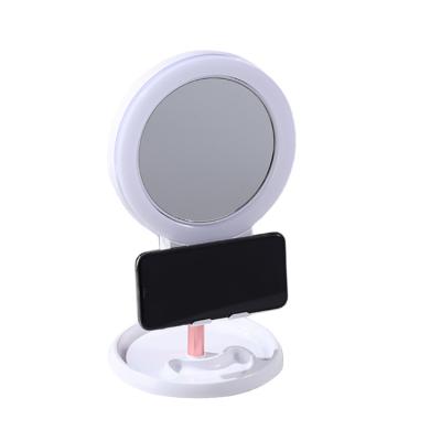 China Lighted Led Mirror Make 10 Times Double Sided Magnification Cosmetic Mirror With Cell Phone Holder Storage Box for sale