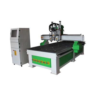 中国 Economical 1325 Wood Working CNC Wood Door Making Pneumatic CNC Router Cutting Machine 販売のため