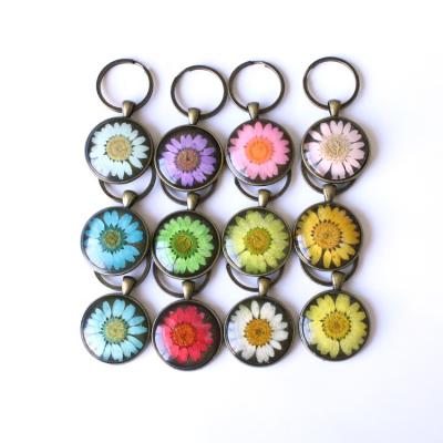 China Promotion Gift QIYUE Single Sided Folder Preserved Dry Flower Crystal Glass Key Chain for sale