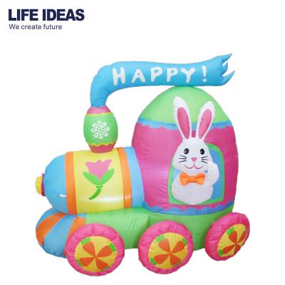 China Cheap Festival Decoration Pick Price Easter Bunny Catch The Train Outdoor Decoration Inflatable Easter Bunny for sale