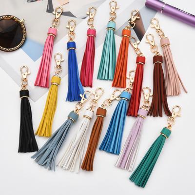 China Leather Decorative Tassel Metal Fashion Key Chain for Bag and Garment Custom Wholesale Suede Tassel Key Chain for sale