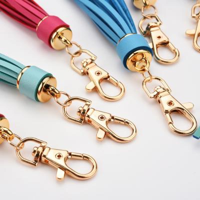 China Decorative Custom Leather Tassel Key Chain Accessories For Bag Garment Gold Sublimation Leather Tassel Wholesale Fringe for sale