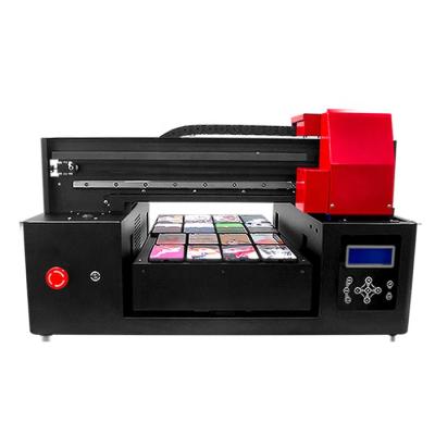 China Metal/wooden card/phonecase/glass/id card/PVC/almost flatbed China High Quality Automatic Roland Uv Printer For Sale for sale