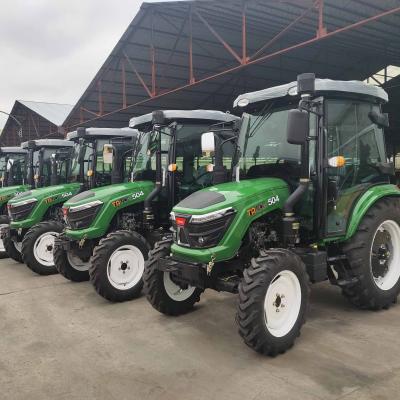 China Farms Good Quality Farm Wheel Tractors 504 604 704 Tractors With Sunshade for sale