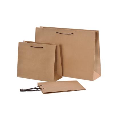 China Food Recyclable High Quality Shopping Handle Color Kraft Paper Packaging Bags for sale