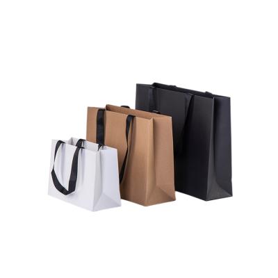 China Recyclable Flat Paper Handles Custom Brown Kraft Paper Shopping Bags With Ribbon for sale