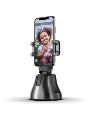 China New Product Black Friday Adjustable Trending Yuntai 360 Degree Rotation Auto Selfie Face Tracking Portable Smart Cell Phone Holder for sale