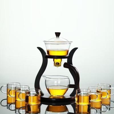 China Viable Automatic Kungfu Tea Set Maker Teapot Magnetic Rotating Heat Resistant Cup for sale