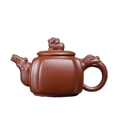 China Stocked most famous Chinese traditional style Yixing teapot in China with dragon shape for sale