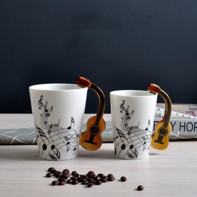 China Creative New Music 250ml Mug Musical Instrument Couple Guitar Student Cup Milk Coffee Gift Mug Water Viable Ceramic Mug for sale