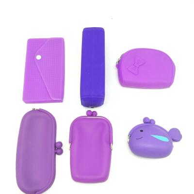 China Waterproof Cheap Colorful Silicone Coin Bag Lady's Mini Christmas Items Prize Items Coin Purse for sale