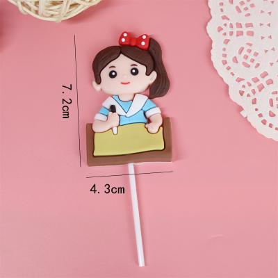 China 2022 New Graduation Party Supplies Unique Luxury PVC Study Boy Girl Cupcake Decoration Back To School Celebrate Graduation Cake Topper for sale