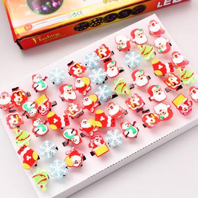 China Creative Luminous Cartoon Instrument Gift Cute Festival Kid Christmas Party Instant Glowing Ring Up Medium Xmas Toy Led Finger Light for sale