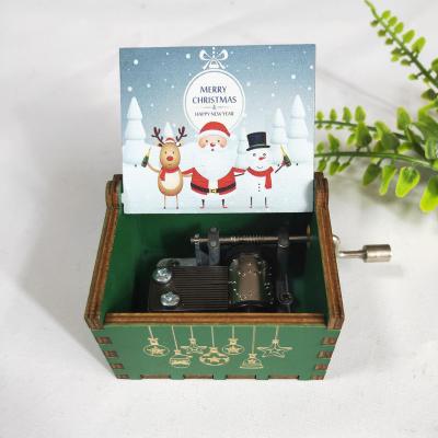 China Hot Selling Christmas Amazon Christmas Mini Products Crank Snowman Santa De Caja Musical Mechanism Gift Wholesale Christmas Wooden Music Box for sale