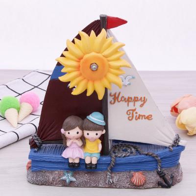 China Cute Home Decoration Love Boy Girl Boat Sunflower Figurine Valentines Wedding Lovers Products Resin Figurine Music Box Couples Gift for sale