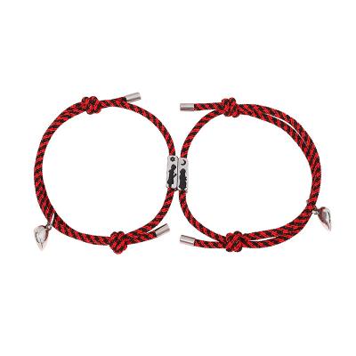 China Romantic Stainless Steel Heart Magnet Cotton Rope Bracelet with Custom Engraved Metal for sale