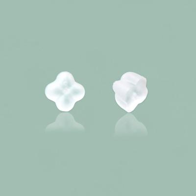 China Back fashionable four leaf clover ear plug silicone anti-drop ear plug plastic transparent non-slip earring for sale