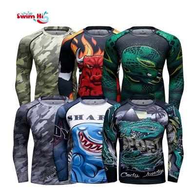 China Sun Protection custom shirt design mma rash guard bjj printed plus size rash guard upf protection uv long sleeve design your own rash guard for sale