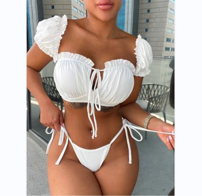 China Breathable Luxury Solid Bottom Side Tie Strap Ruffle Bikini Hotwife Two Piece Swimwear Swimwear With Short Sleeve For Women for sale