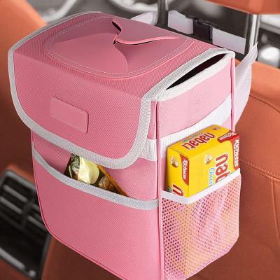 China Brief & Single Color Car Trash Can Leak Proof And Waterproof Trash Can Car Trash Can With Lid With Car Hanging Bag With Storage Mesh Pocket for sale