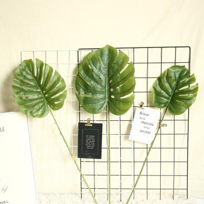 China Real Touch Big Flower Green Leaf Monster Bend Silk Plant Artificial Plastic Tree for sale