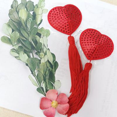 China Comfortable Sexy Red Rhinestone Nipple Pies Heart Shape Breast Pies Crystal Nipple Cover Tassels Reusable for sale