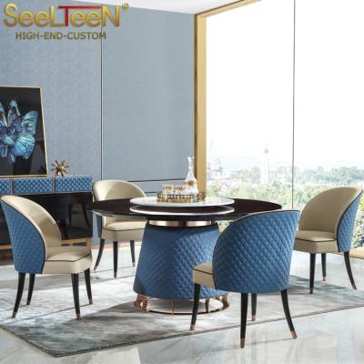 China Modern Blue Leather Base Round Revolving Marble Dining Table for sale