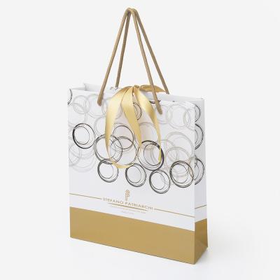 China Custom Luxury Recyclable Logo Printing Princess Clothing Cosmetic Shopping Paper Bag With Ribbon Handles for sale