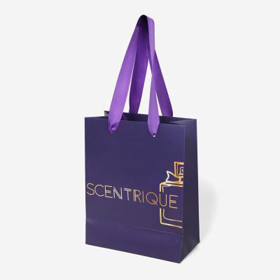 China Purple Exquisite Handle Gift Kraft Paper Bag Recyclable Crafting Portable Custom Luxury Paper Bag for sale