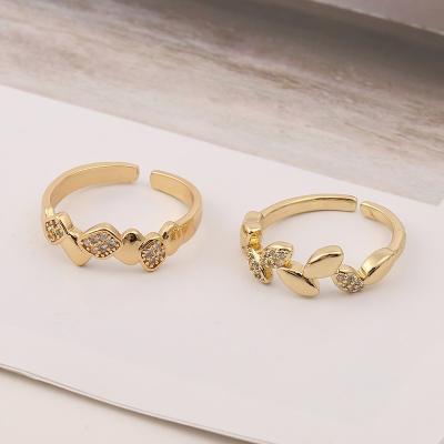 China New 2021 Romantic Korean Temperament Flower Ring Fashion Charm 18k Hollow Irregular Gold Ring for sale