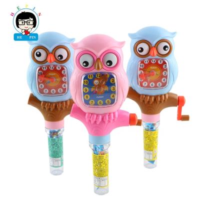 China Lovely Control Cartoon Toys Colorful Owl Shape Alarm Clock Candy Candy Jumping Toys For Children for sale