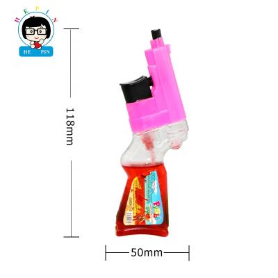 China OEM Order Full Size Gun Shaped Spray Candy Mixed Color Fruity Flavor Liquid Candy for sale