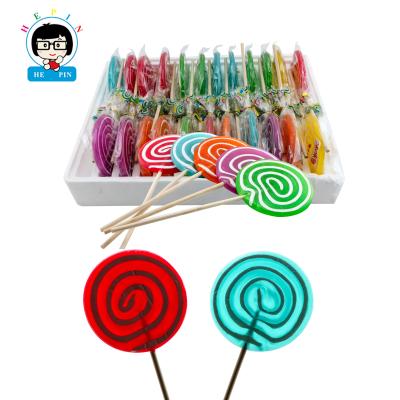 China Natural Handmade Fruit Flavor Swirl Round Shaped Hard Candy With Packing Box Candy Lollipop for sale