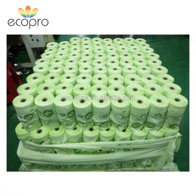 China BIODEGRADABLE Eco Friendly Light Green Cornstarch T-shirt Bag On Roll With Paper Core For Supermarket for sale