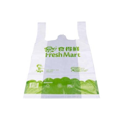 China Biodegradable Compostable Vest Carrier Bag 100% Biobags Plastic Certificated T-Shirt On Roll for sale