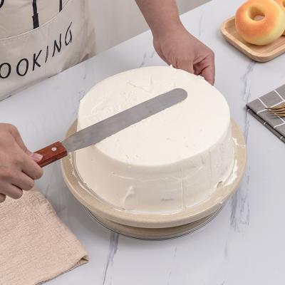 China Viable Baking Tools Round Ladder Wheat Straw Rotating Cake Decorating Turntable for sale