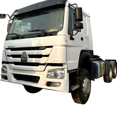 China Sinotruck howo tractor trailer truck main truck new 420 horsepower bare diesel engine racing wheel color rough cab 6985x2496x3230 for sale