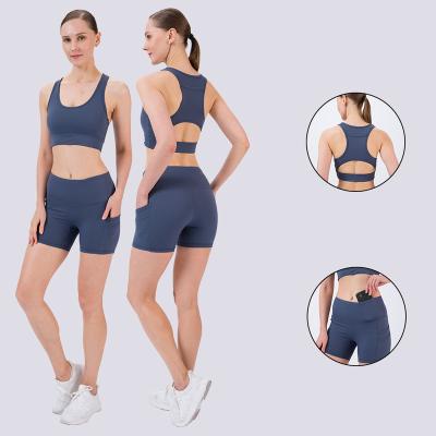 China Breathable Custom Yoga Set For Women 2 Piece Support Lift Up Yoga Sports Bra Cultivate Top Fitness And High Waist Yoga Shorts Pants Set for sale