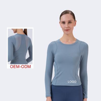 China Stylish Women Fitness Sweat Yoga Suit Breathable Workout Lady Long Sleeve Sports Shirts 2 Pieces Crop Top Seamless for sale