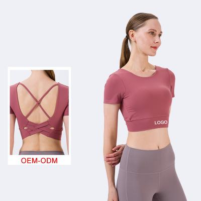 China Breathable New Trend Back Cross Ties Sports Women Grow Gym Top T-Shirts Fitness Yoga Seamless Bra for sale