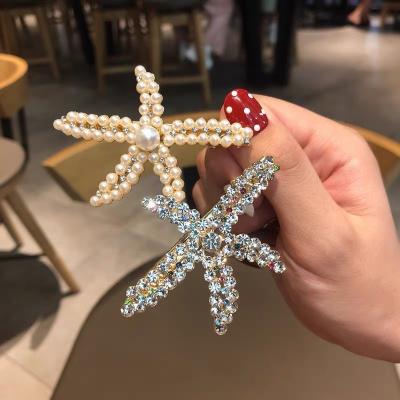 China Best Selling Alloy Girls Hair Accessories Star Shape Hair Pins Wedding Korean Pearl Crystal Hair Clips For Women Accessories for sale