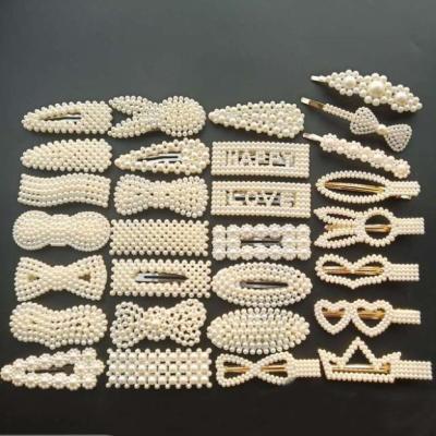 China Wholesale Alloy Fashion Jewelry Fancy Long Clips White Pearl Hair Clip Accessories for sale