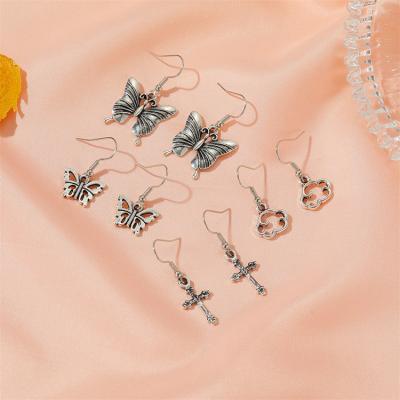 China BOHEMIA retro butterfly cloud earrings hot sale personality Halloween props cross earrings for sale