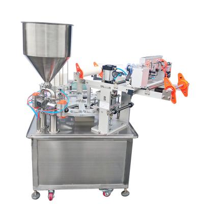 China Full Automatic Turntable Liquid Plastic Cup Ice Cream Food Yogert Filling Sealing Machine for sale