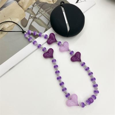 China Purple Resin Rice Beads Cell Phone Lanyard Soft Pottery Smiley Butterfly Anti-lost Women's Phone Chain Heart Bead Phone Strap for sale