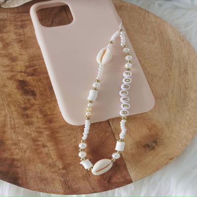 China Imitation Star Letter Pearl White Shell Beaded Mobile Phone Lanyard Resin Beach Acrylic Beads Phone Chain For Women Jewelry for sale