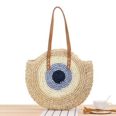 China Straw Woven Raffia Circle Rattan Bags Crossbody Bag Vintage Handmade Fashion Beach Round Shoulder Bag for sale