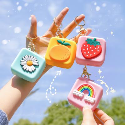 China Fashionable Cute Strawberry Rainbow Ring Kawaii Monederos Para Mujer Silicona Pequeno Key Chain Purse Coin Silicone Key Chain for sale