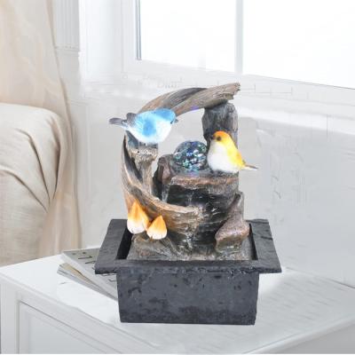 China Modern Desktop Resin Water Pumps Mini Indoor Fountain Artificial Waterfalls Table Decoration Electric Desktop Statue For Home for sale