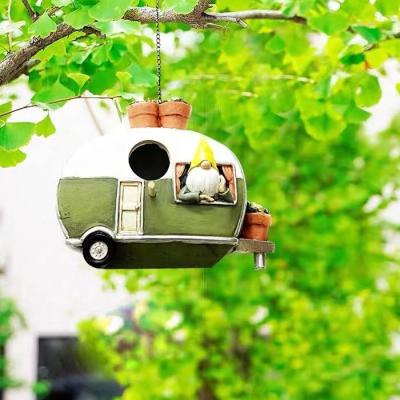 China Eco-friendly Hand Painted House Decoration Bird House Decoration Wholesale Resin Nature Outdoor Nest Aviary for sale